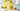 Three Iced yellow beverages in glasses with straws pineapple and mint