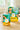 Two boxes of Full Moon Tea Company Evening Peach tea on a wooden surface with a blurred background.