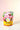 Cherry Cherry Blossom white tea pouch on a light pink background